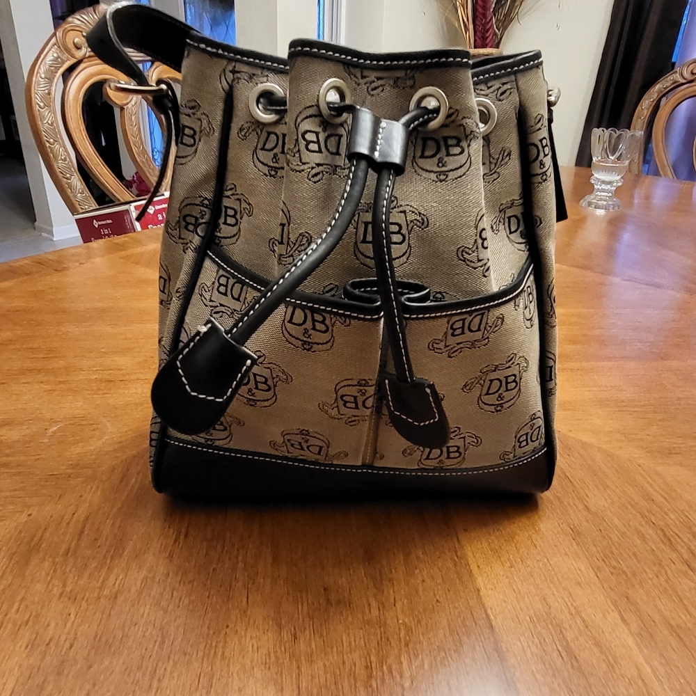 Vintage canvas and leather drawstring Dooney and Bourke handbag